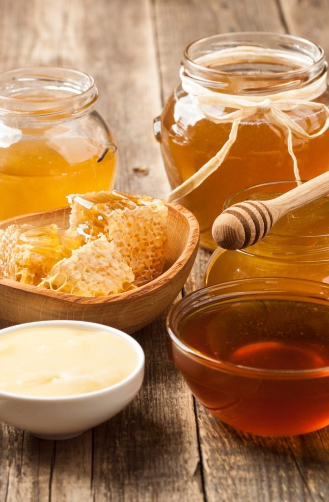 various-honey-on-wooden-table.jpg